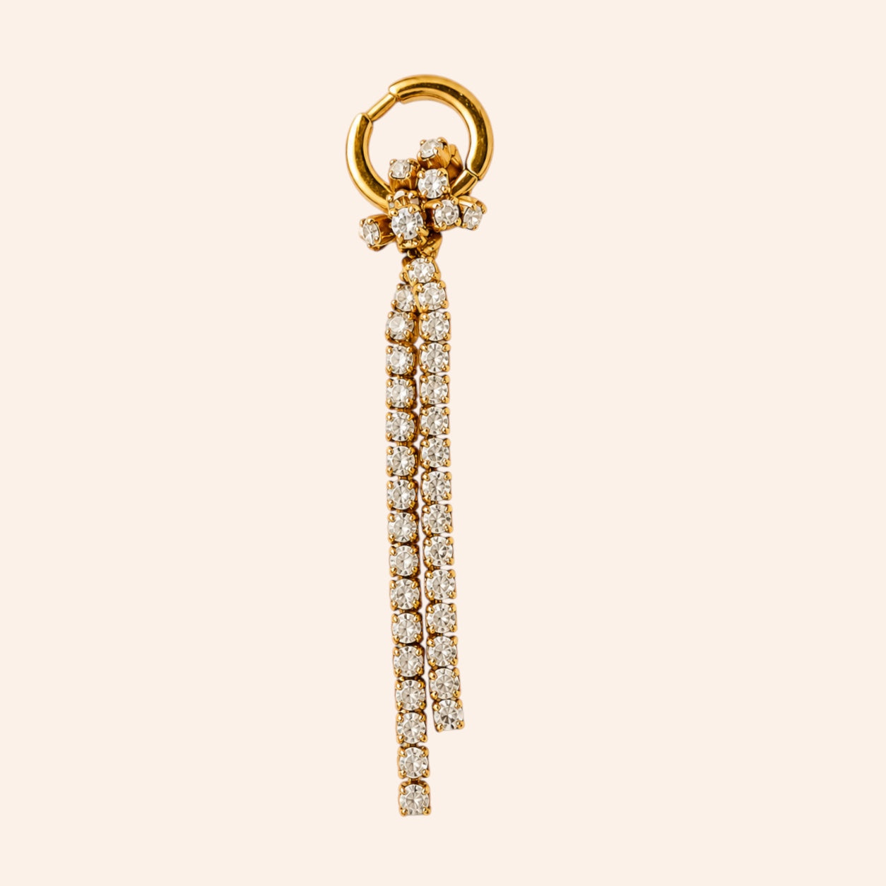 Ma boutique Cascade interchangeable gold earring charm with two long, sparkling crystal-encrusted chains.