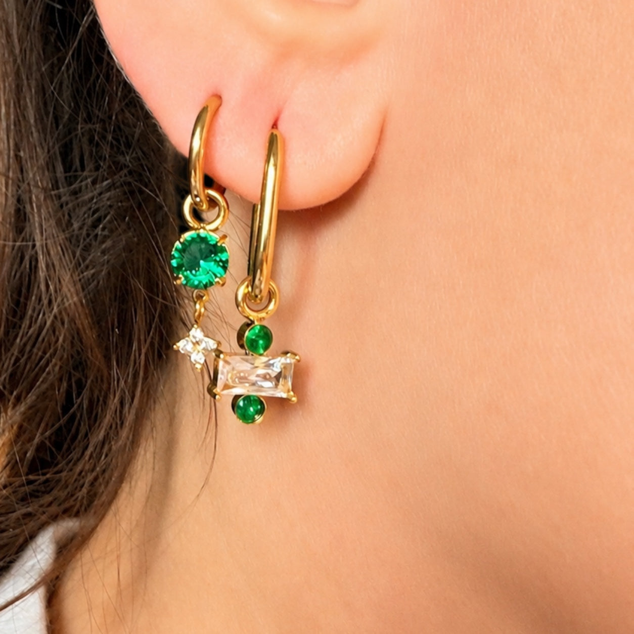 Ma boutique Celeste gold earring charm with green round and rectangular stones and a small star detail on a hoop