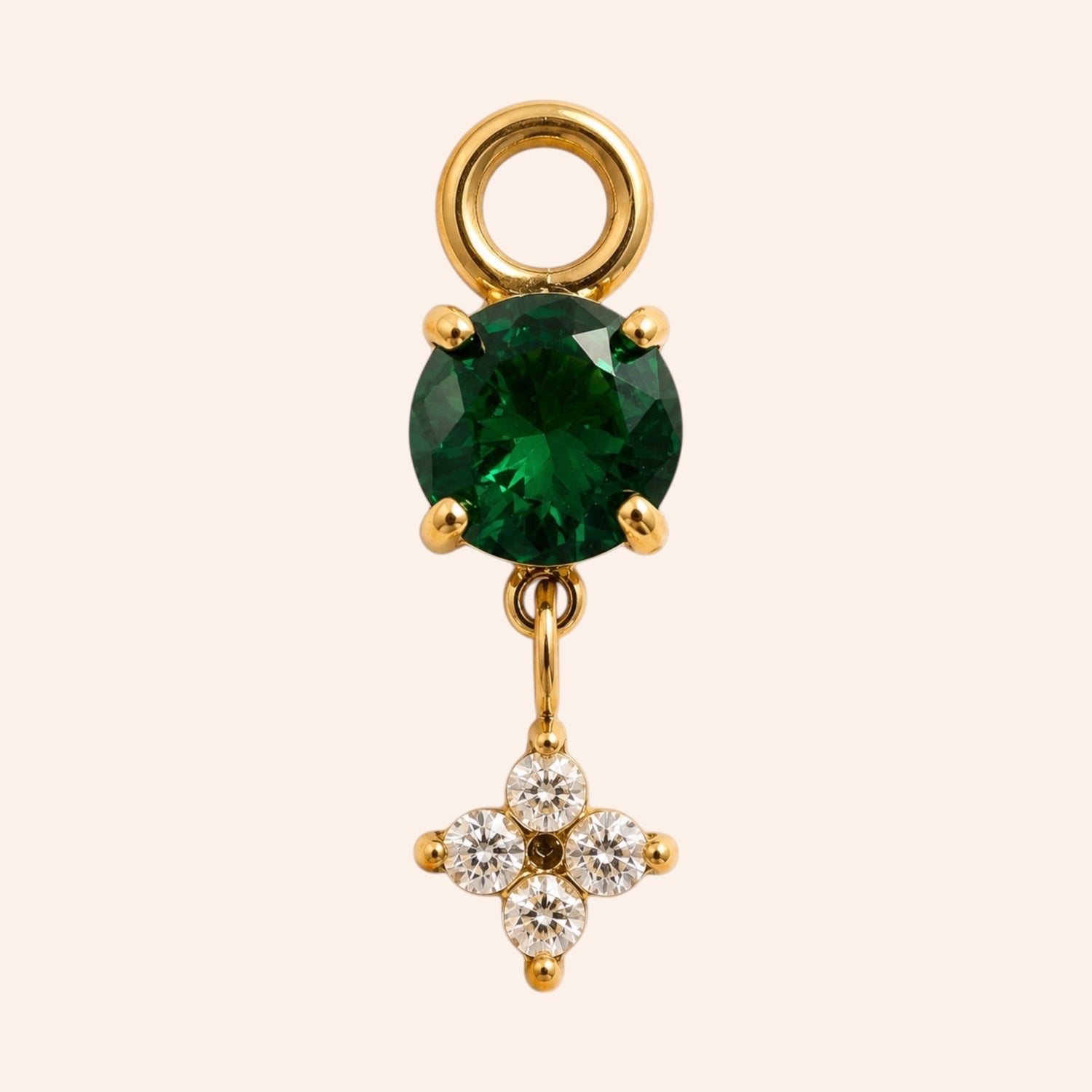 Ma boutique Céleste interchangeable earring charm featuring a round green stone and a small gold star detail