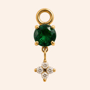 Ma boutique Céleste interchangeable earring charm featuring a round green stone and a small gold star detail