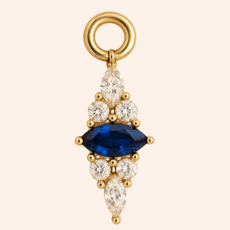 Ma boutique Corail interchangeable earring charm in gold-tone stainless steel with a blue marquise and clear stones.