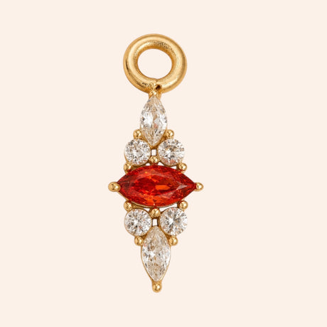 Ma boutique Corail interchangeable earring charm featuring a marquise-cut coral stone and clear crystals in gold steel