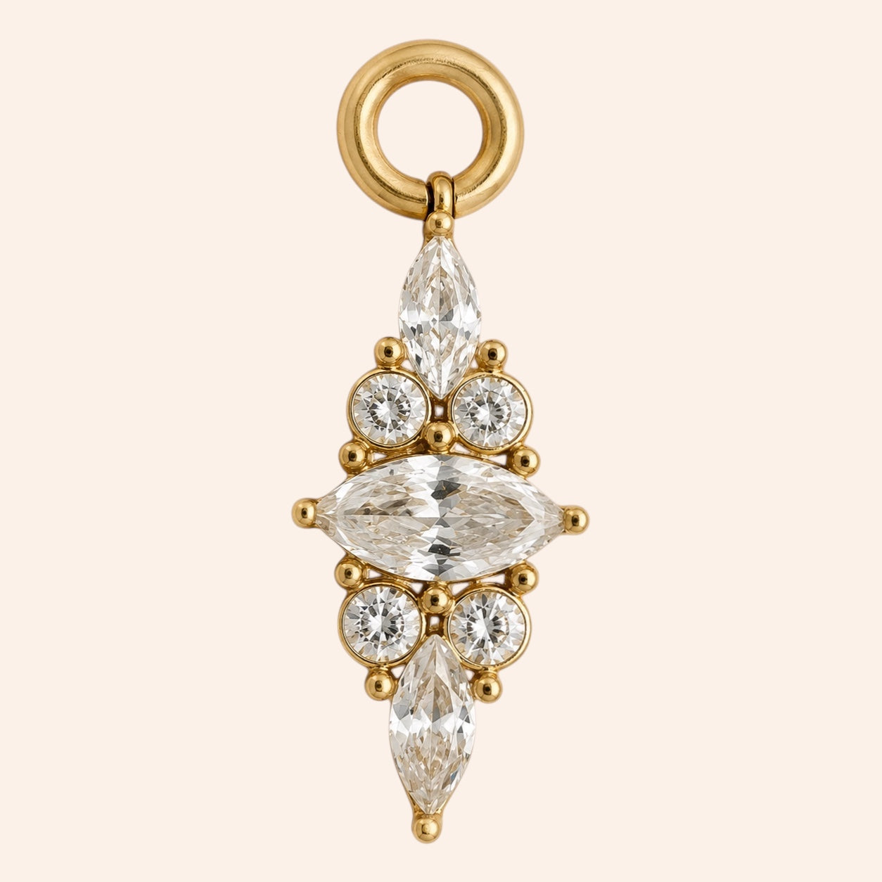 Ma boutique Corail interchangeable earring charm featuring a clear tapered stone set in gold-tone stainless steel