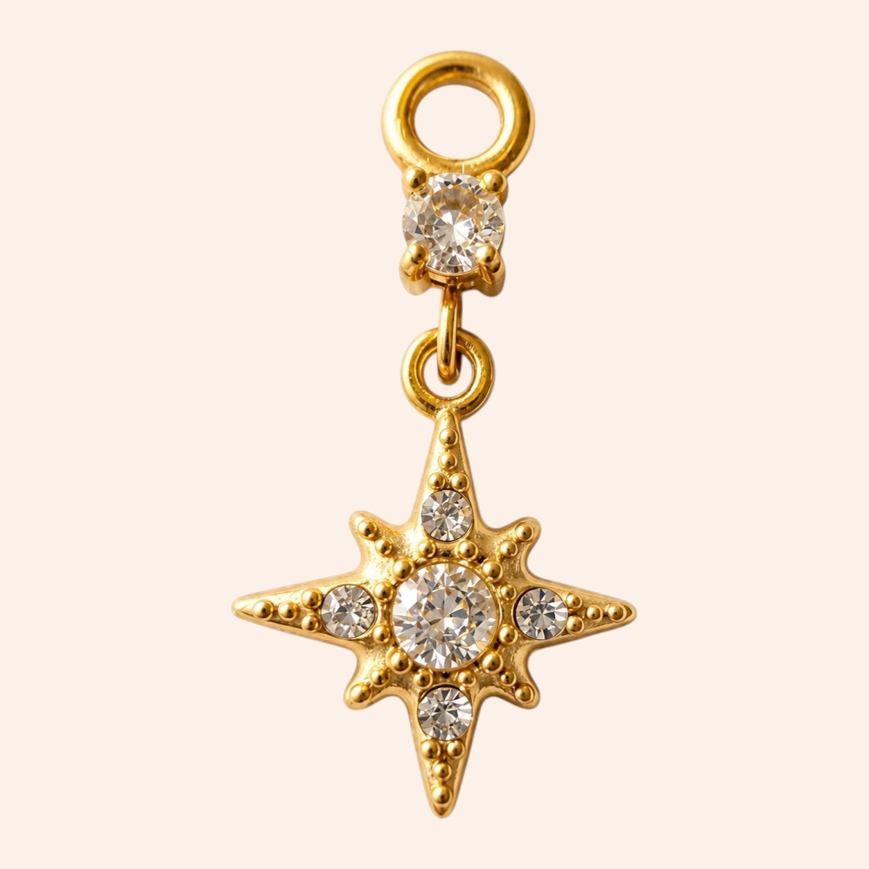 Ma boutique Astre gold star earring charm made of stainless steel with clear crystal stones.