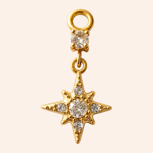 Ma boutique Astre gold star earring charm made of stainless steel with clear crystal stones.