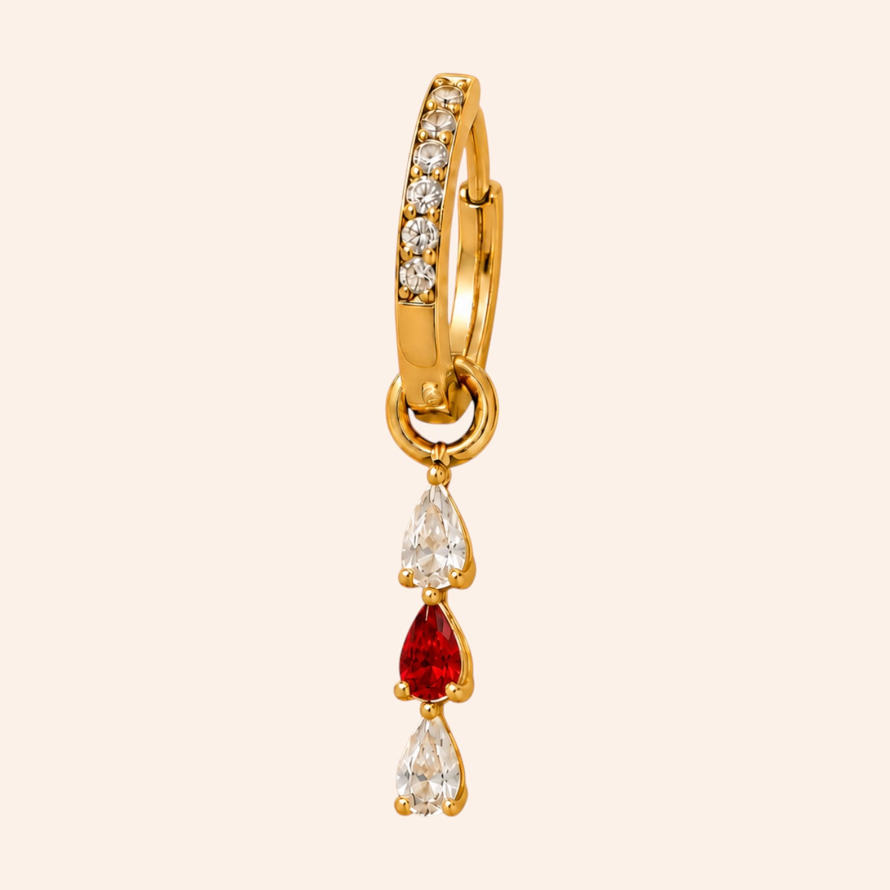 Ma boutique Goutte interchangeable gold earring charm with teardrop-shaped clear and red stones on a hoop base