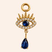Ma boutique Nazar gold interchangeable earring charm featuring a blue eye motif with crystals and a teardrop pendant