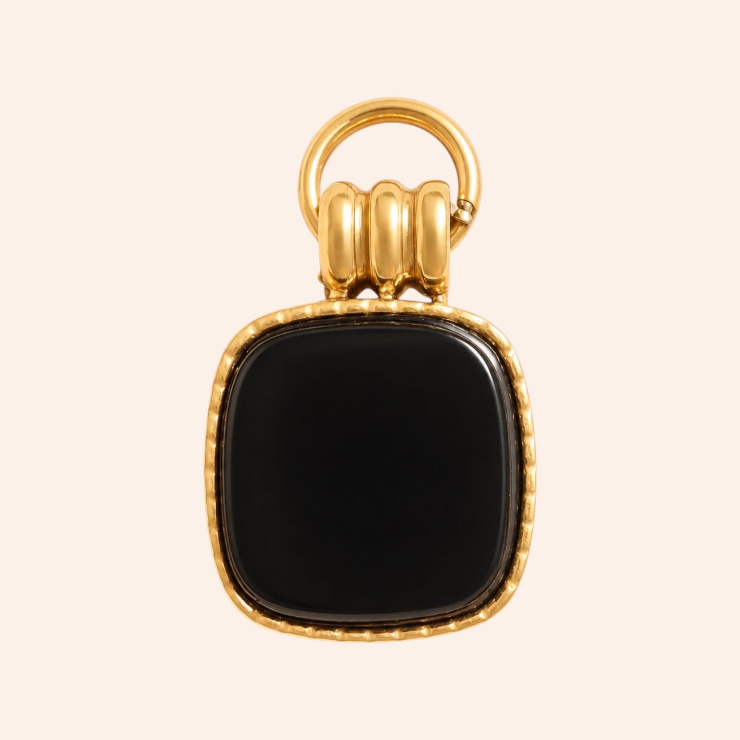 Ma boutique Nox interchangeable earring charm featuring a square black onyx stone set in gold-tone stainless steel.