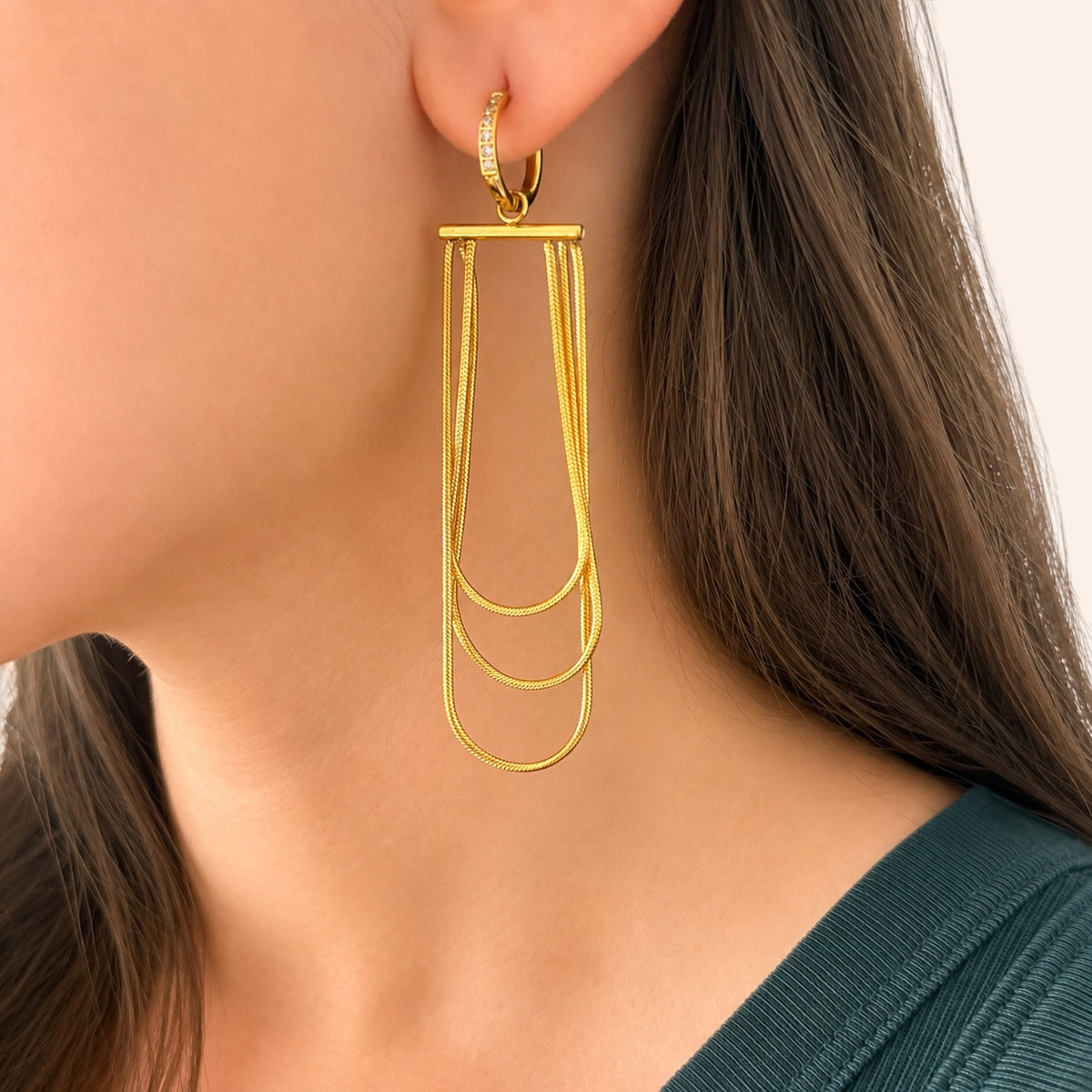 Ma boutique Ondine gold stainless steel interchangeable earring charm with long layered wire chains on a hoop