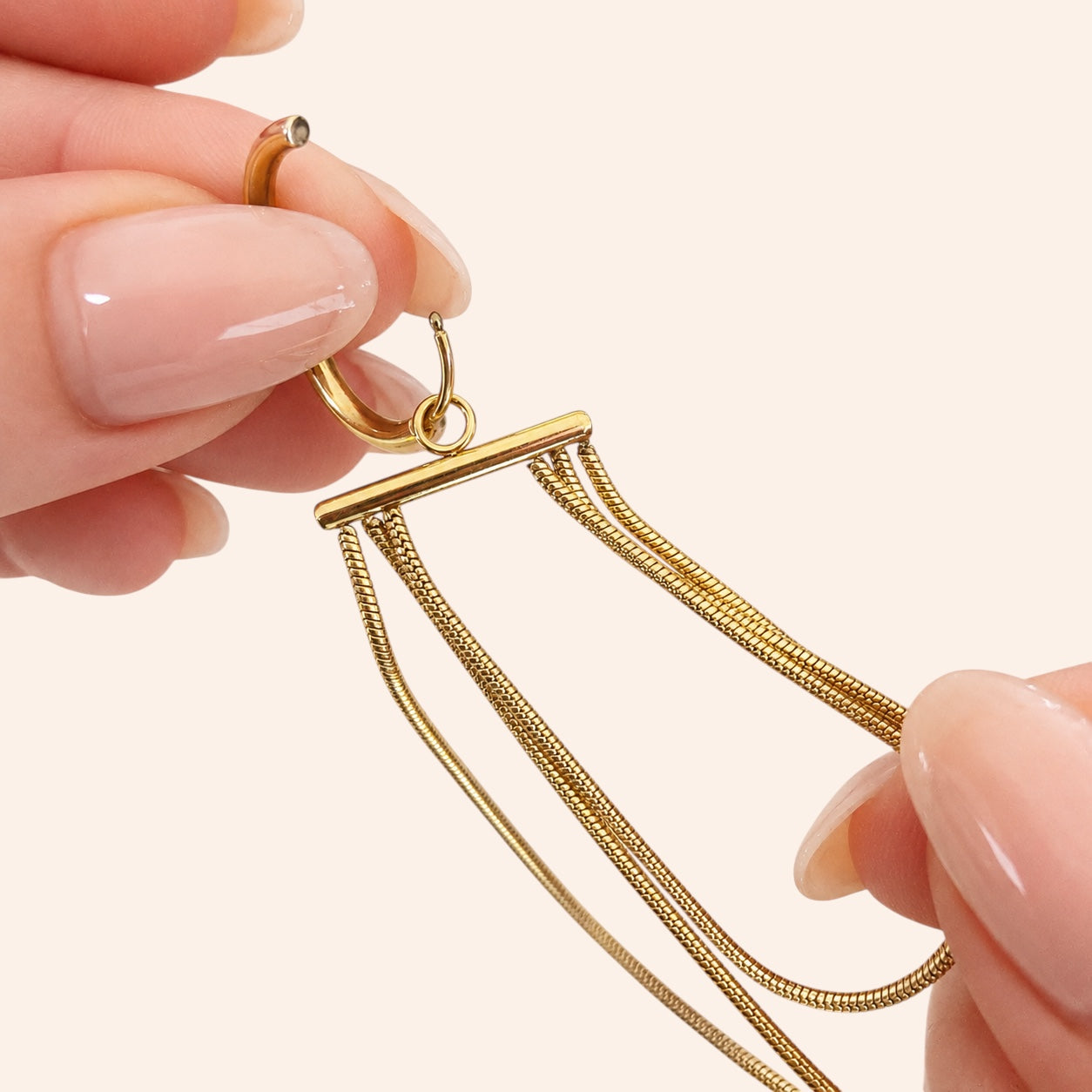 Ma boutique Ondine gold-toned stainless steel interchangeable earring charm with long delicate chain strands