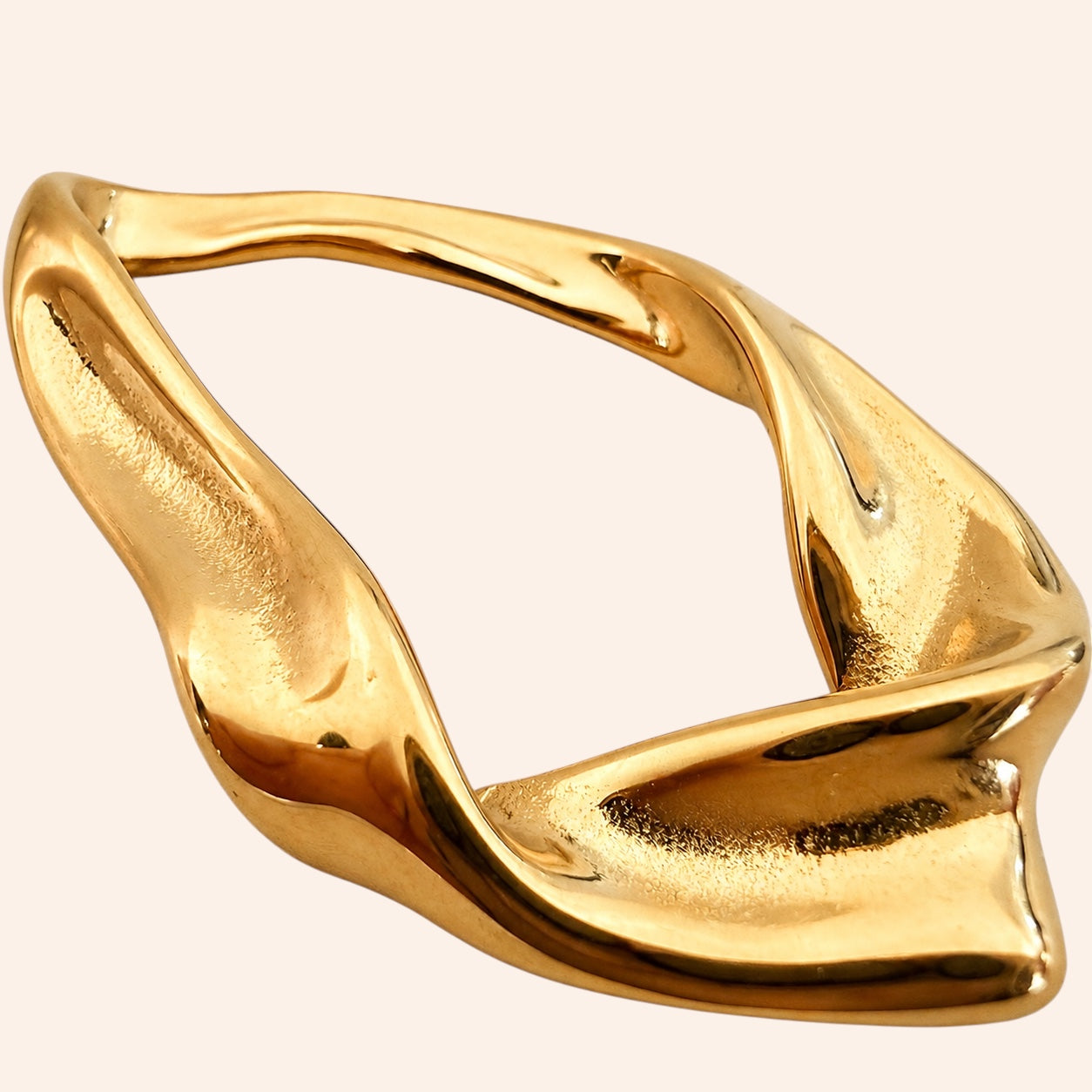 Ma boutique Sillage gold-toned stainless steel interchangeable earring charm with an organic sculptural open shape.