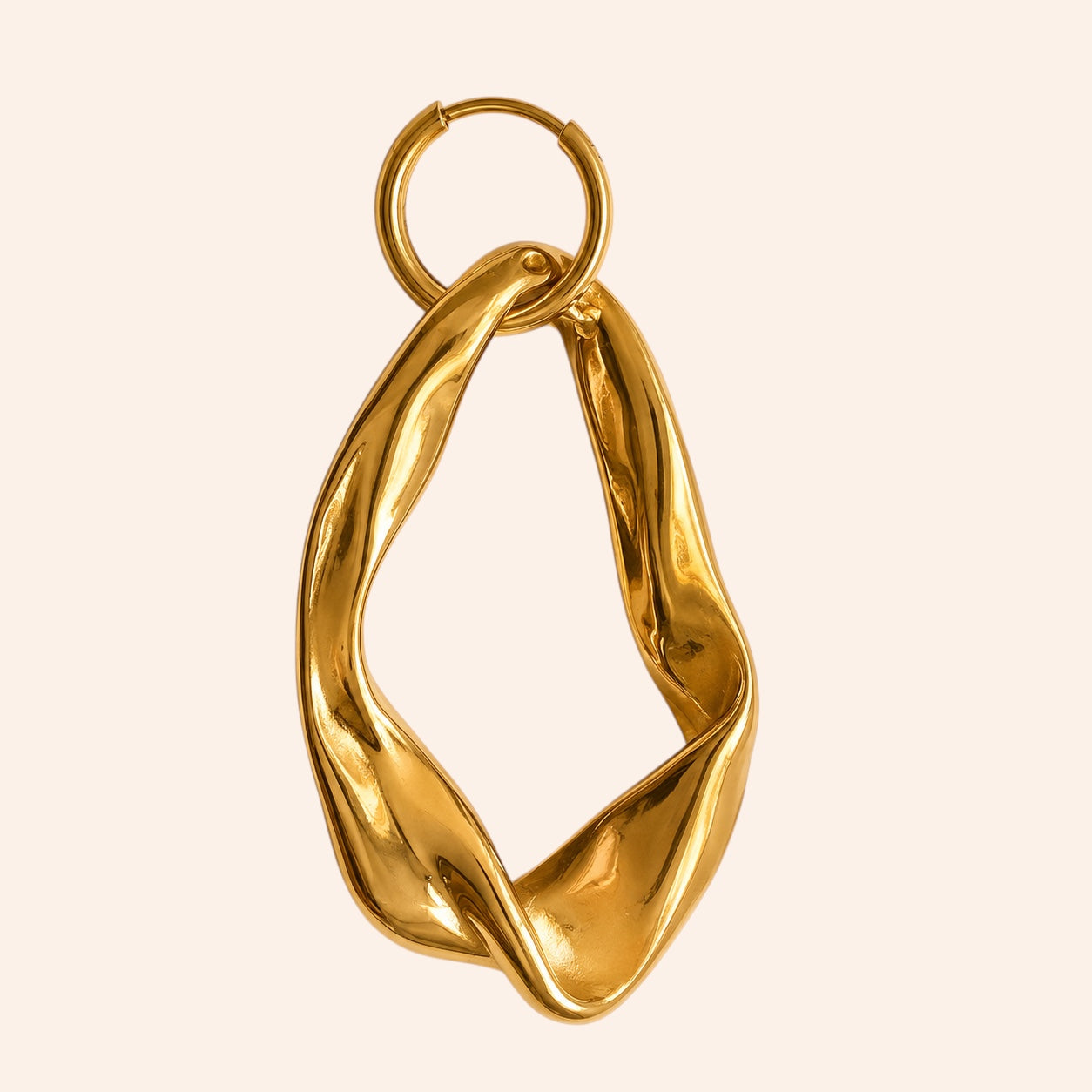 Ma boutique Sillage gold stainless steel interchangeable earring charm with an organic sculptural open shape.
